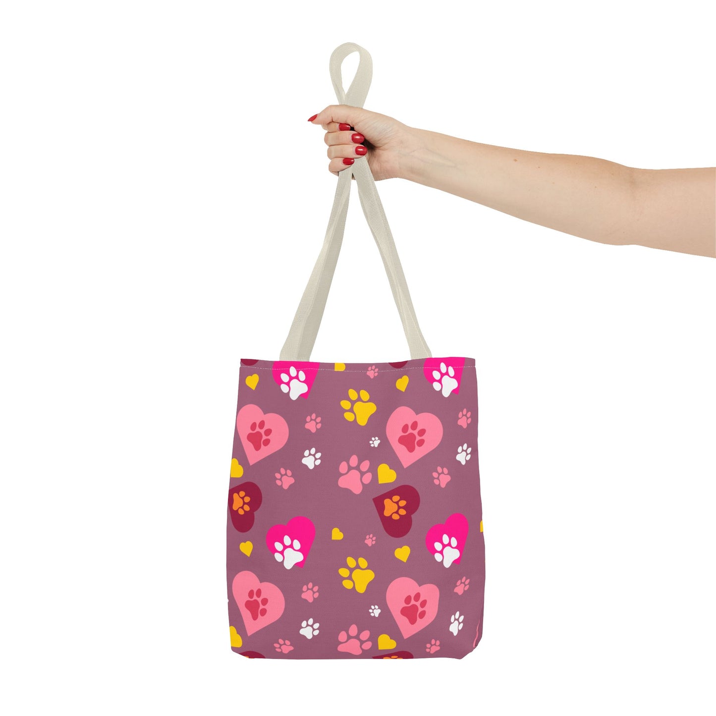 ¡Demuestra tu amor por tus peludos amigos con este clásico bolso de mano con estampado de patas! 🐾