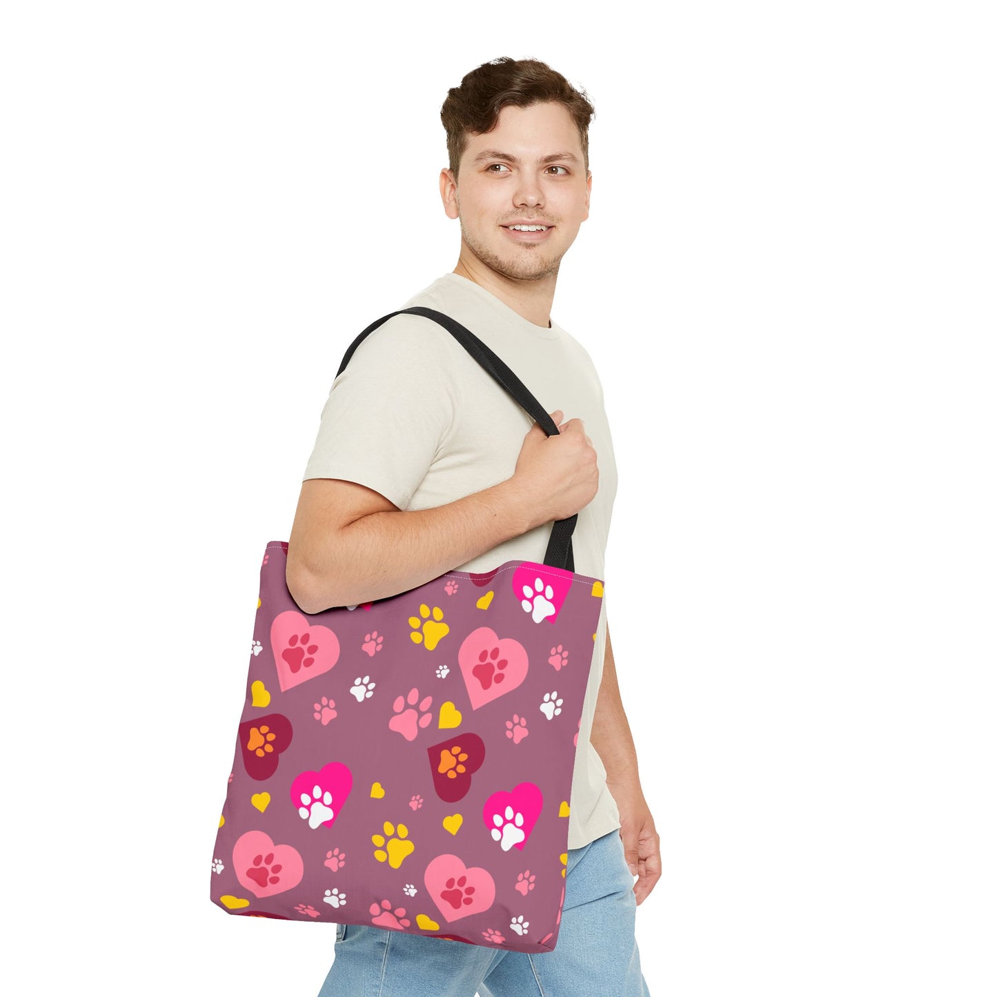 ¡Demuestra tu amor por tus peludos amigos con este clásico bolso de mano con estampado de patas! 🐾
