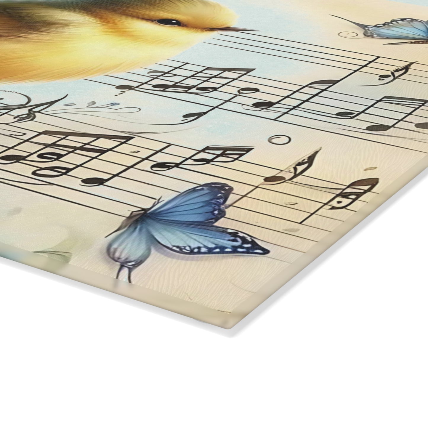Tabla de cortar de vidrio templado con forma de pájaro rodeada de mariposas, flores y notas musicales.