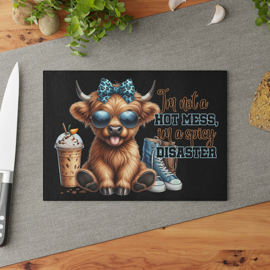 "I'm Not a Hot Mess; I'm a Spicy Disaster" – Highland Cow Glass Cutting Board