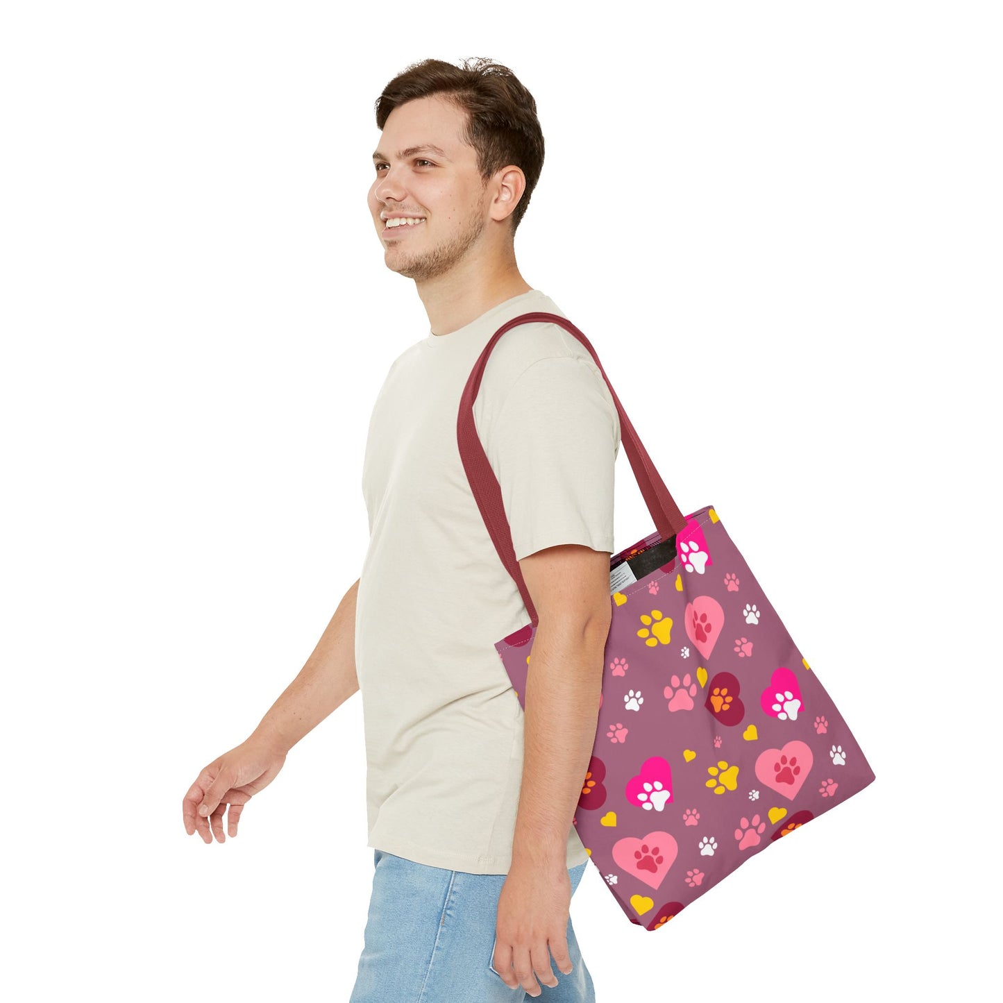 ¡Demuestra tu amor por tus peludos amigos con este clásico bolso de mano con estampado de patas! 🐾