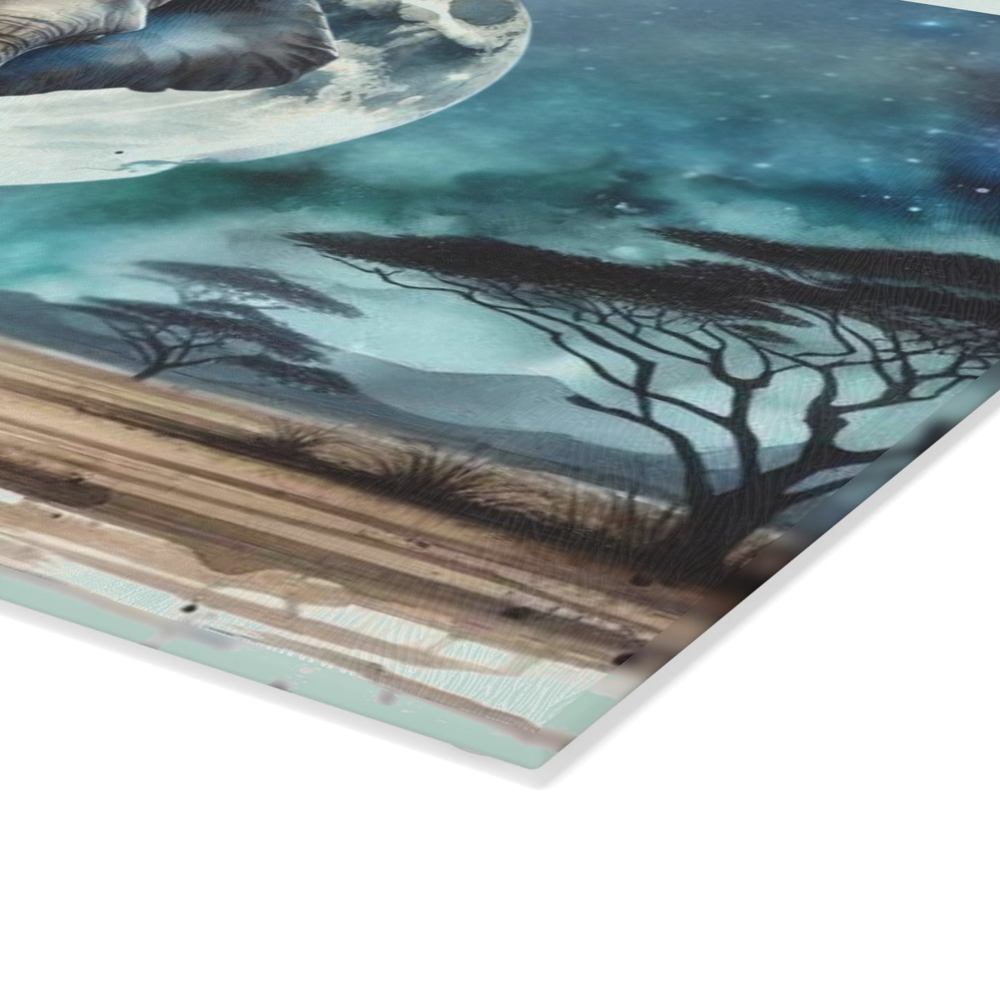 Tabla de cortar de vidrio con forma de mamá y bebé elefante, con una luna llena brillante detrás de ellos