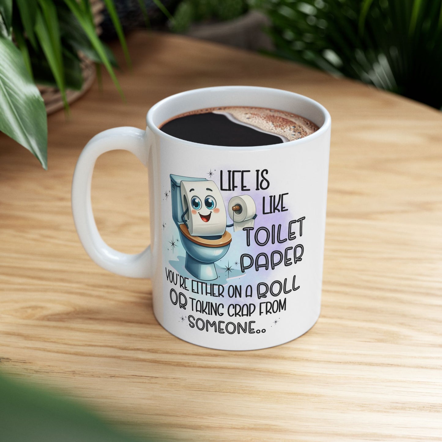 Taza de café "La vida es como el papel higiénico": humor de baño divertidísimo en cada sorbo