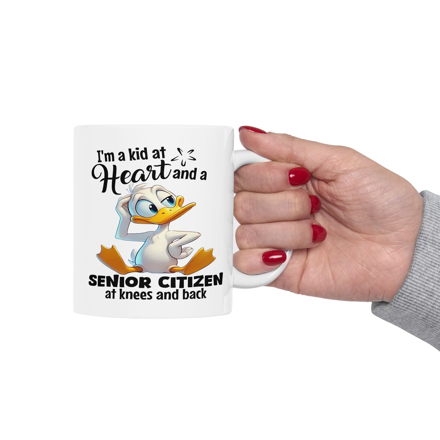 Taza de café divertida con forma de pato “Niño de corazón”: ¡humor para envejecer con gracia!