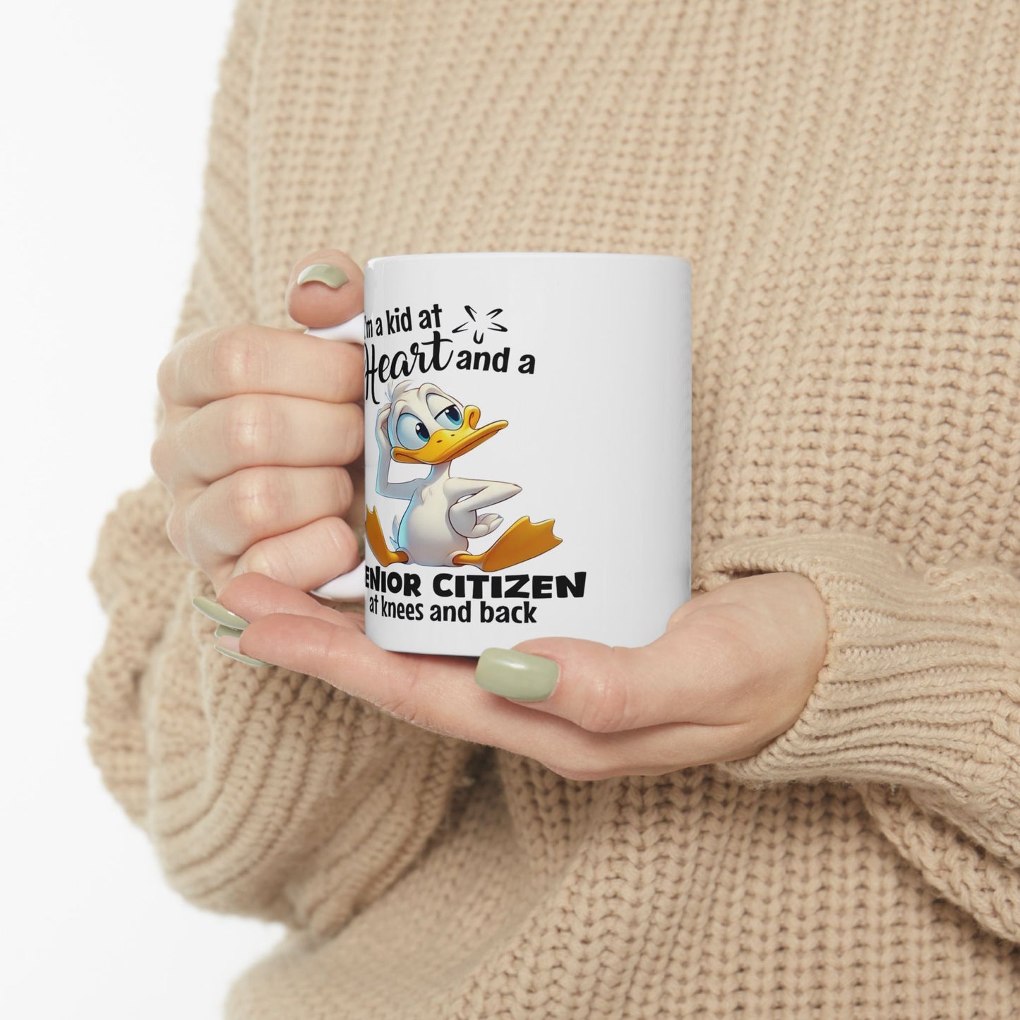 Taza de café divertida con forma de pato “Niño de corazón”: ¡humor para envejecer con gracia!