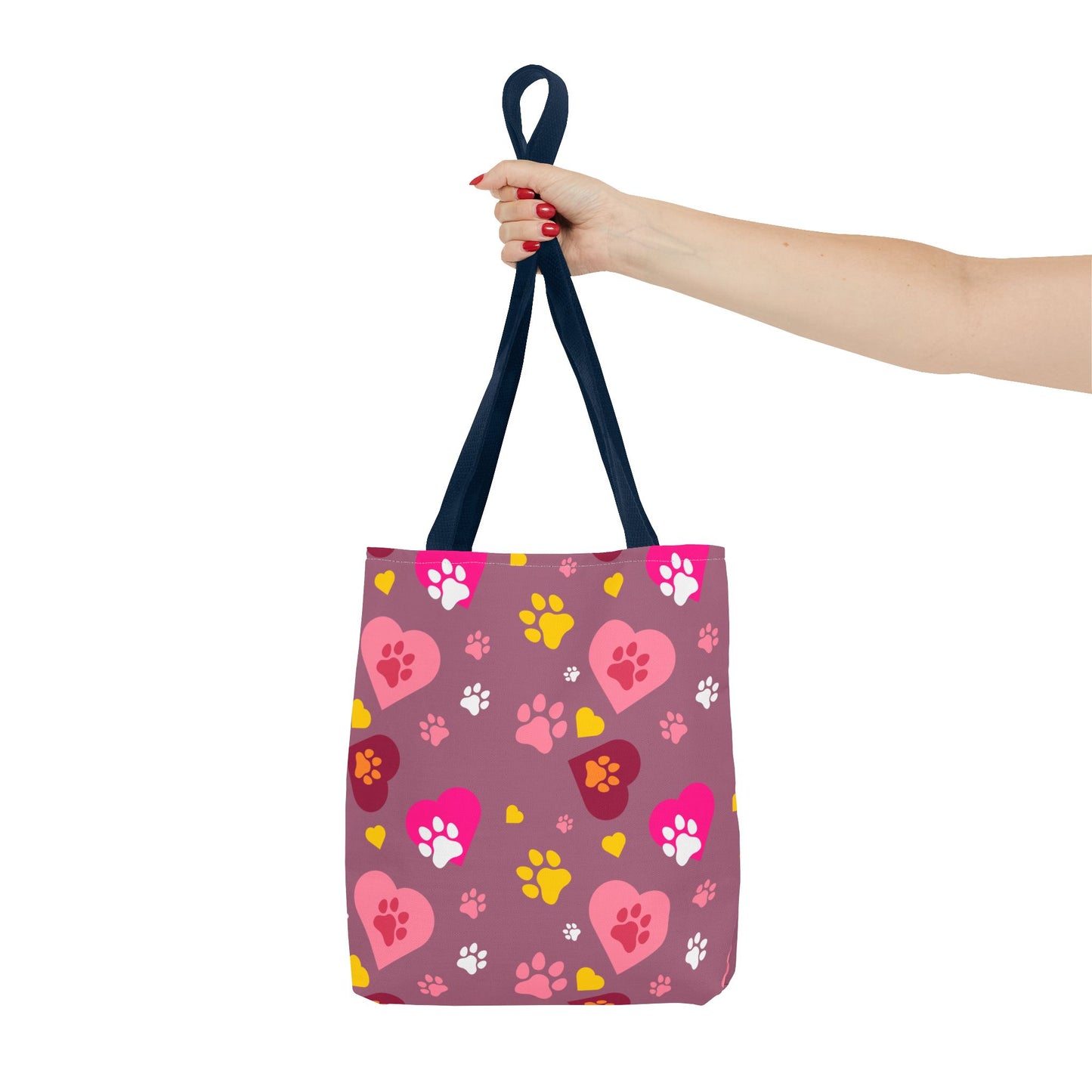 ¡Demuestra tu amor por tus peludos amigos con este clásico bolso de mano con estampado de patas! 🐾