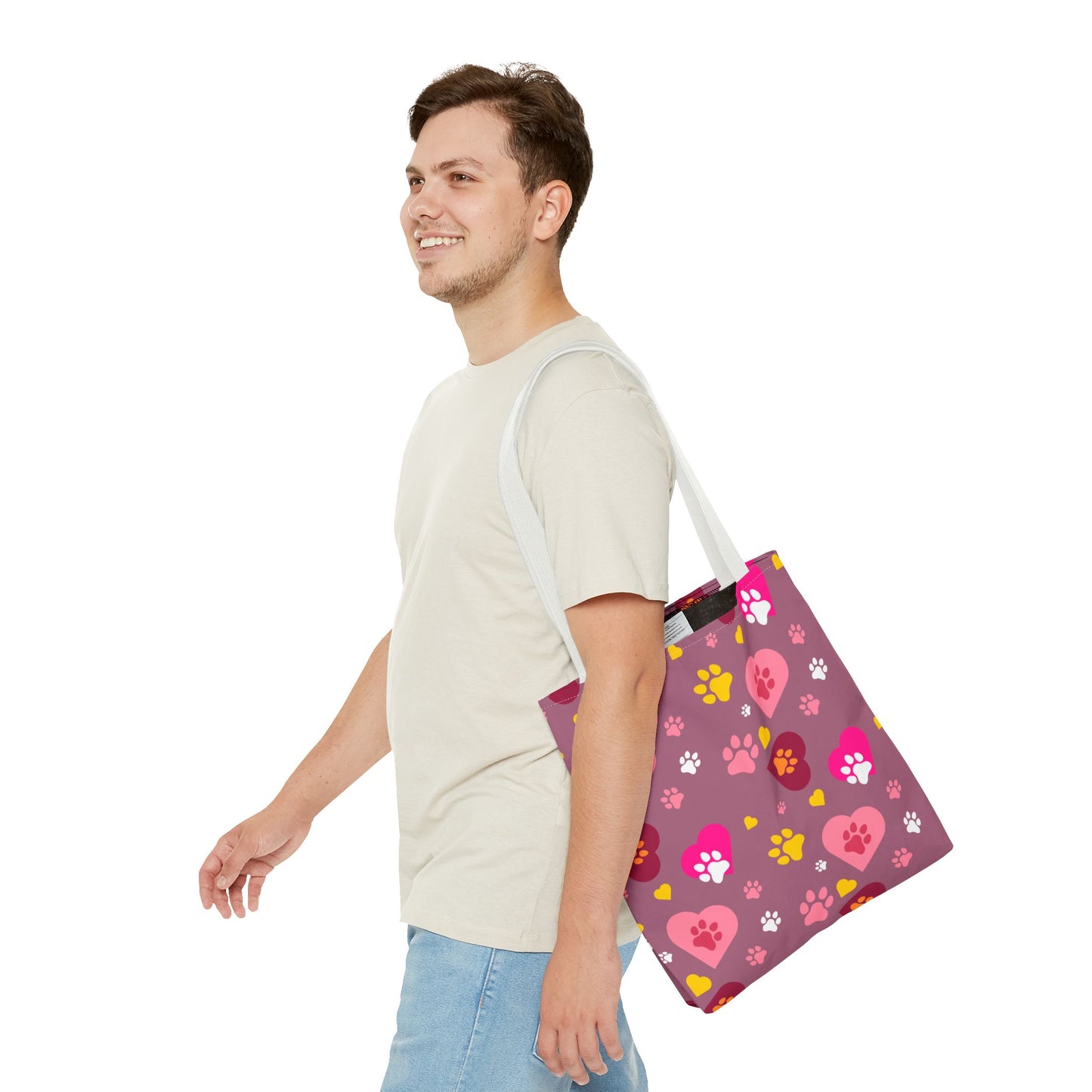 ¡Demuestra tu amor por tus peludos amigos con este clásico bolso de mano con estampado de patas! 🐾