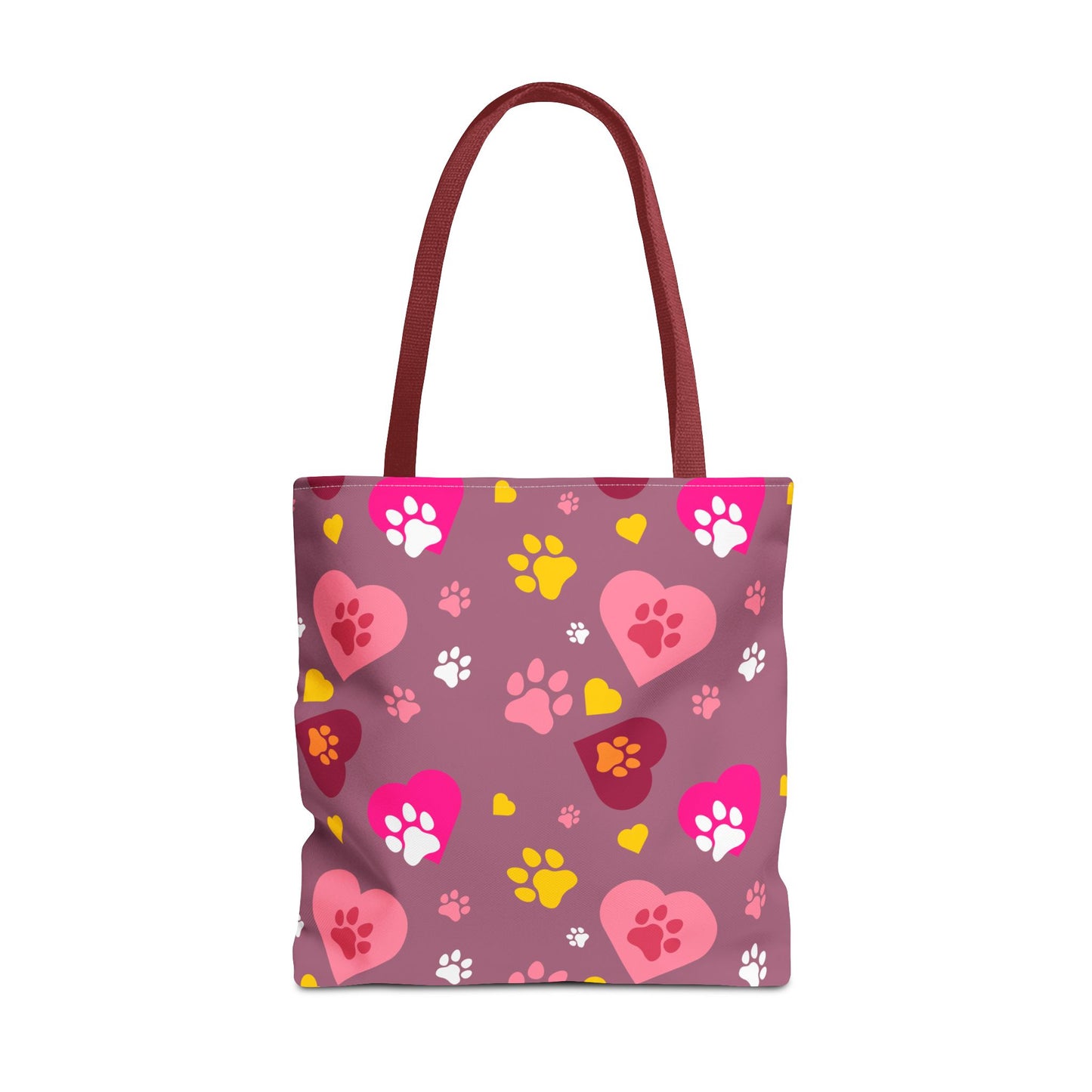 ¡Demuestra tu amor por tus peludos amigos con este clásico bolso de mano con estampado de patas! 🐾