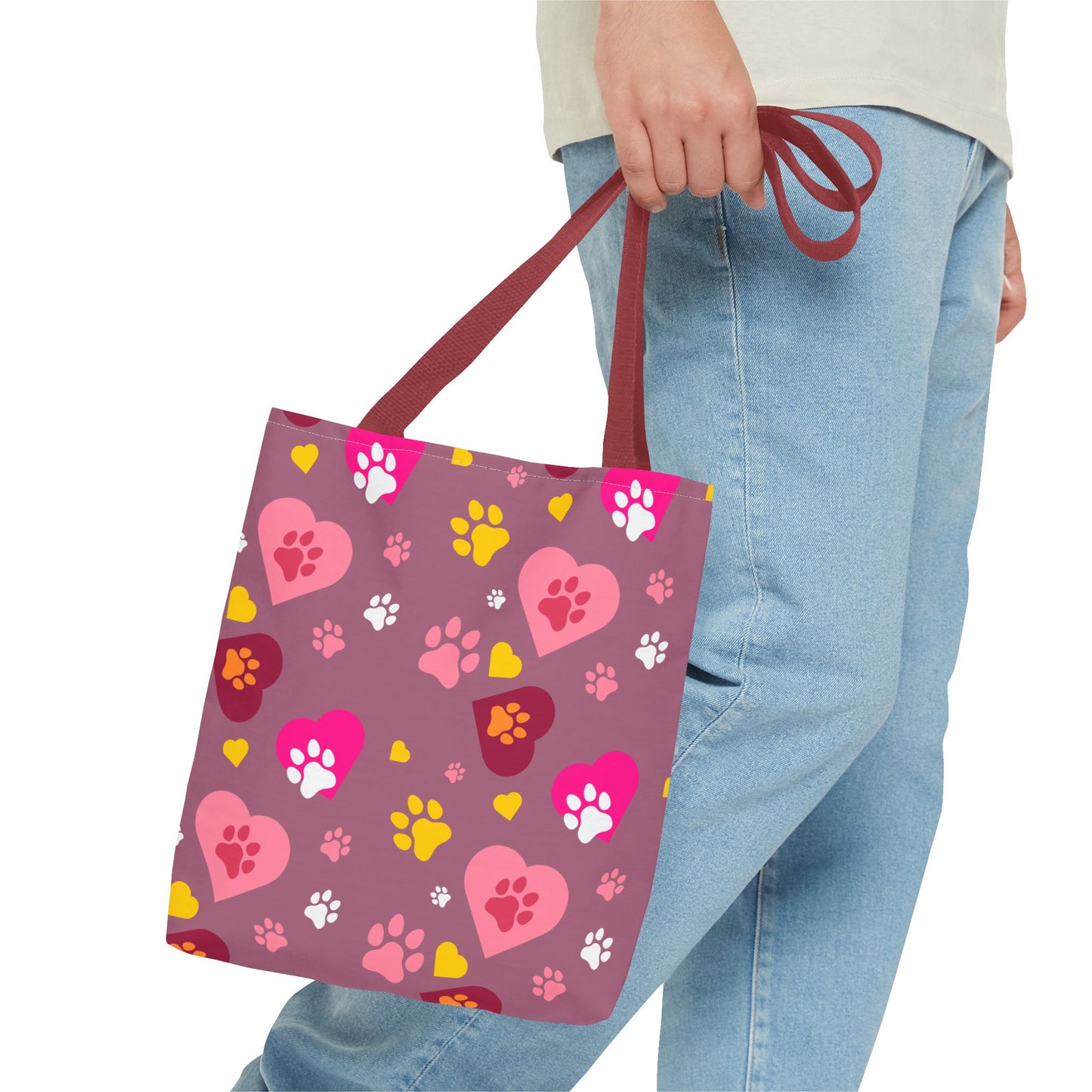 ¡Demuestra tu amor por tus peludos amigos con este clásico bolso de mano con estampado de patas! 🐾
