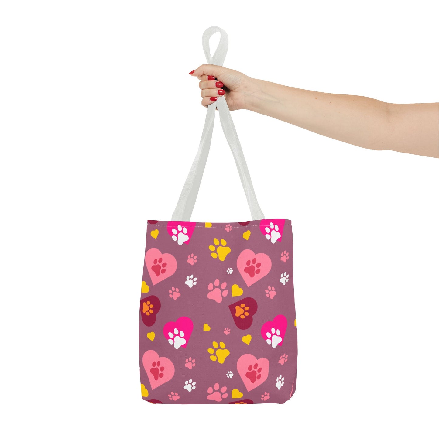 ¡Demuestra tu amor por tus peludos amigos con este clásico bolso de mano con estampado de patas! 🐾