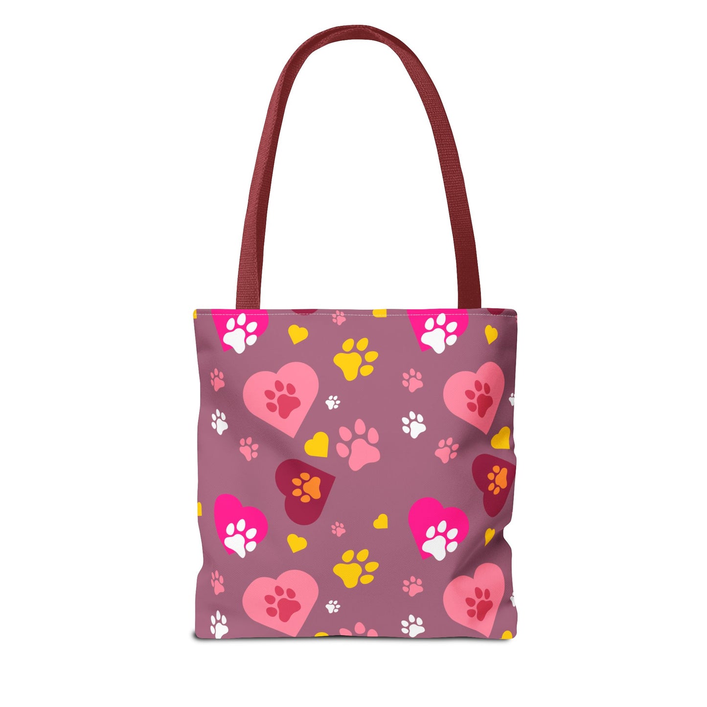 ¡Demuestra tu amor por tus peludos amigos con este clásico bolso de mano con estampado de patas! 🐾
