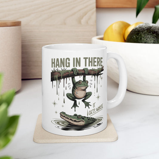 🐸 Hang in There Funny Frog Mug – Dark Humor with a Splash of Sass 🐊