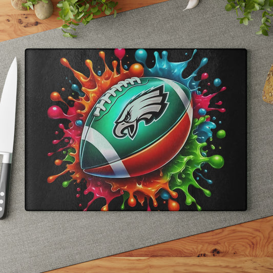 Tabla de cortar de vidrio con esferas llamativas y salpicaduras de color: arte vibrante para cocinas modernas