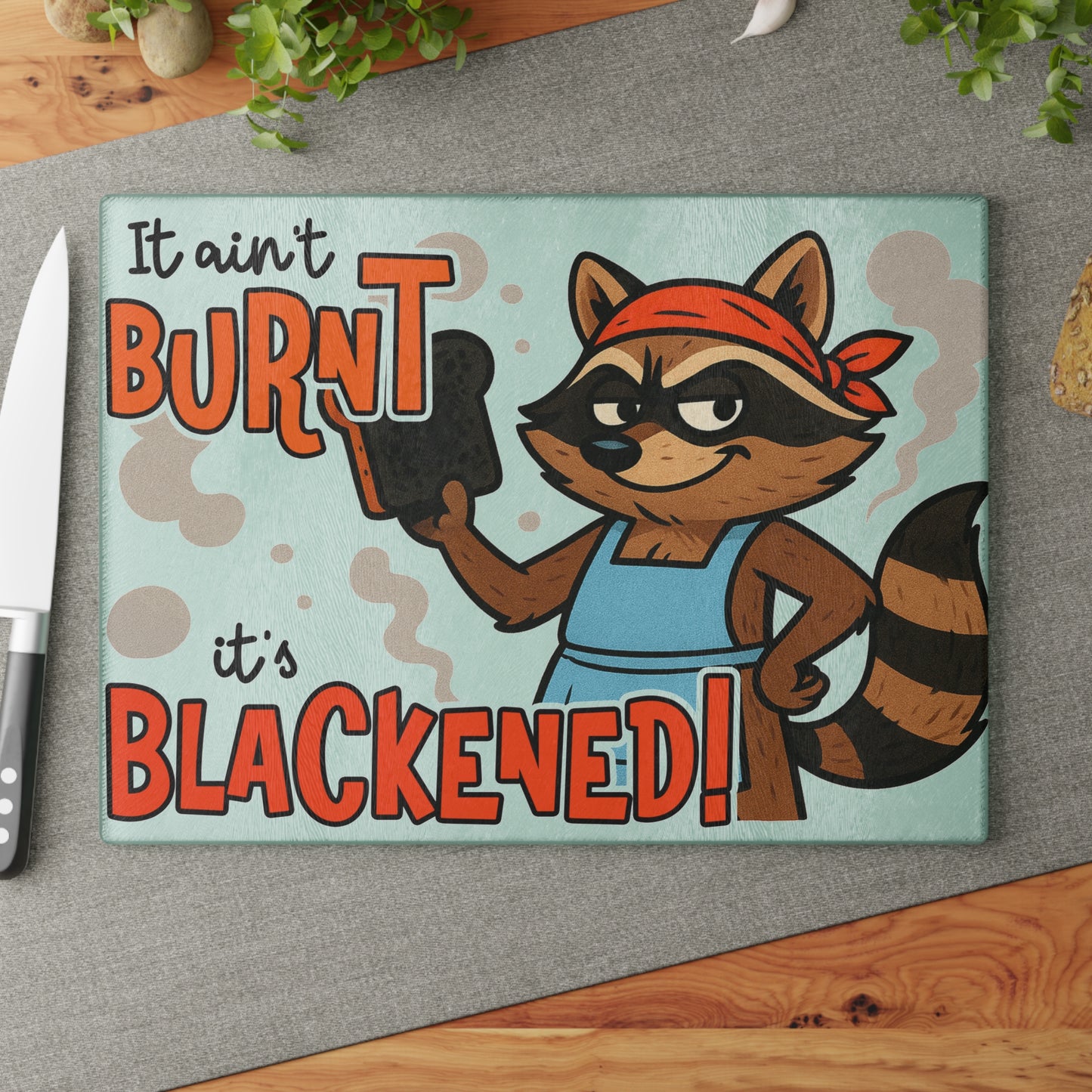 🦝🔥 Funny Raccoon Cutting Board – “It Ain’t Burnt, It’s Blackened” 😆