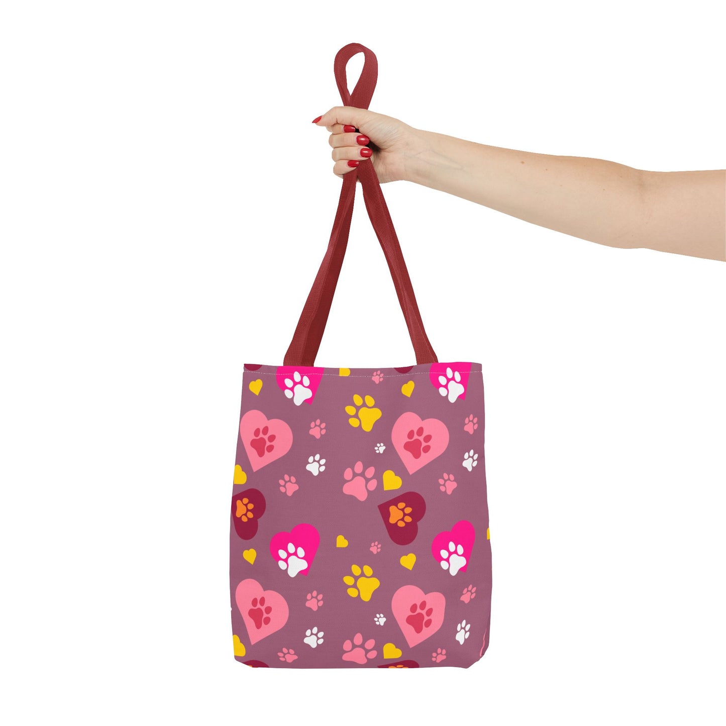 ¡Demuestra tu amor por tus peludos amigos con este clásico bolso de mano con estampado de patas! 🐾