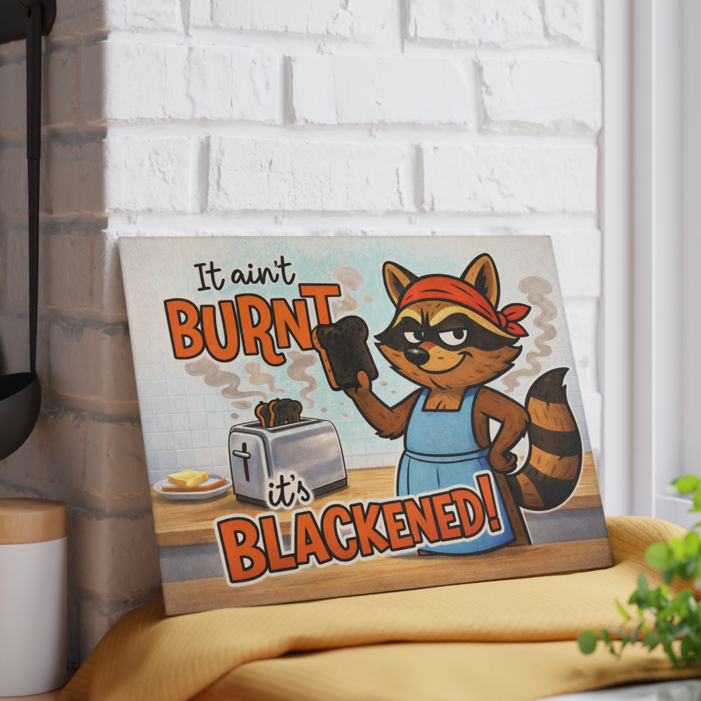 It Ain’t Burnt, It’s Blackened Glass Cutting Board – Sassy Raccoon Kitchen Art with Attitude