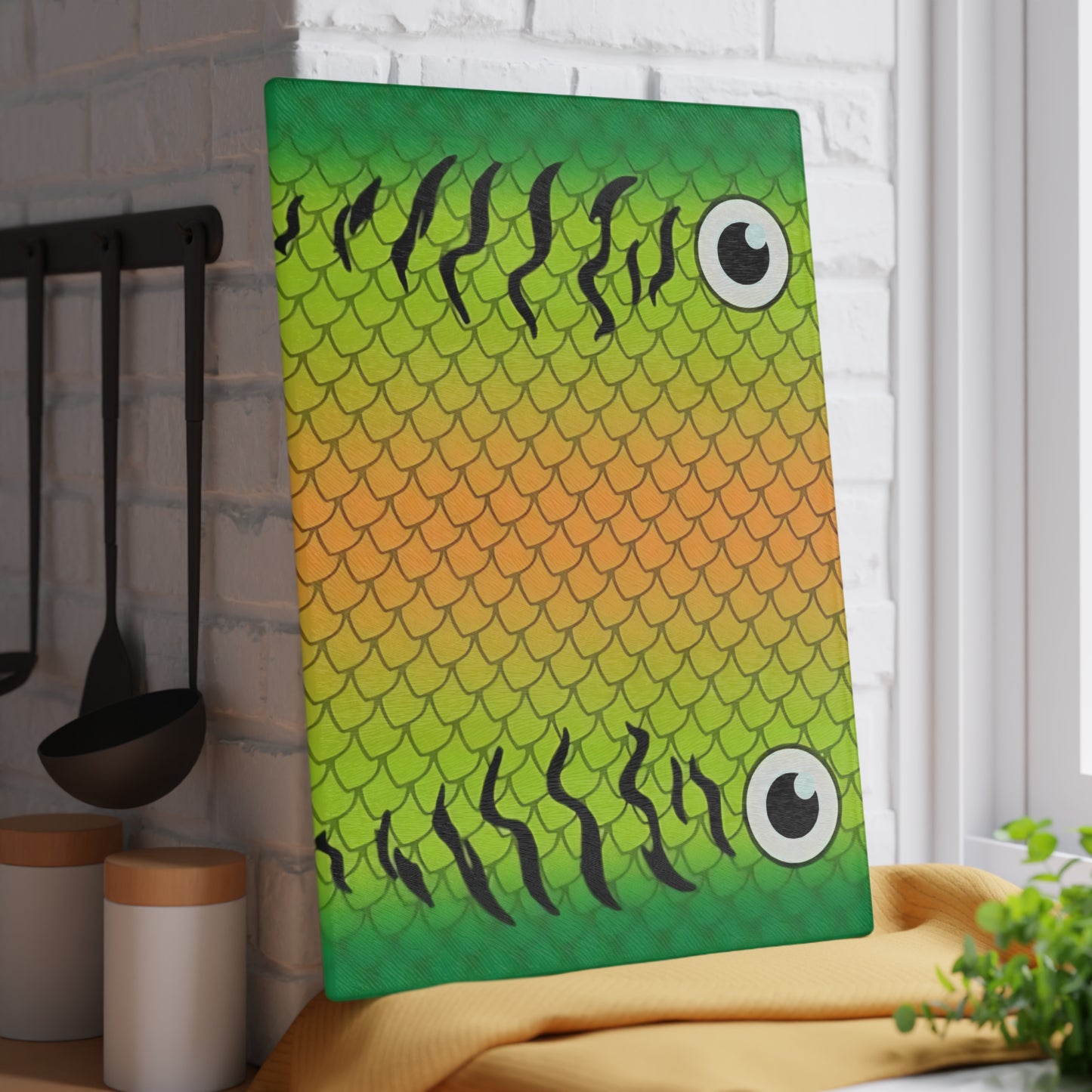 Green & Gold Fish Face Glass Cutting Board – Bold Coastal Artwork with Playful Scales