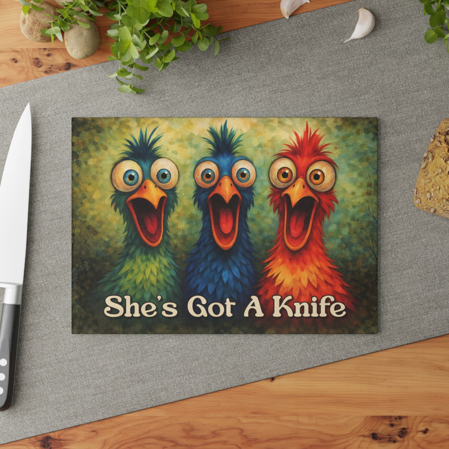 She’s Got a Knife Glass Cutting Board – Colorful Chicken Trio Art with Bold Kitchen Humor