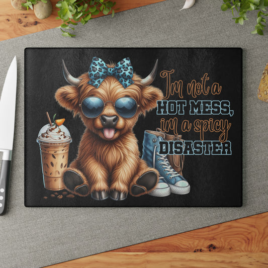 "I'm Not a Hot Mess; I'm a Spicy Disaster" – Highland Cow Glass Cutting Board
