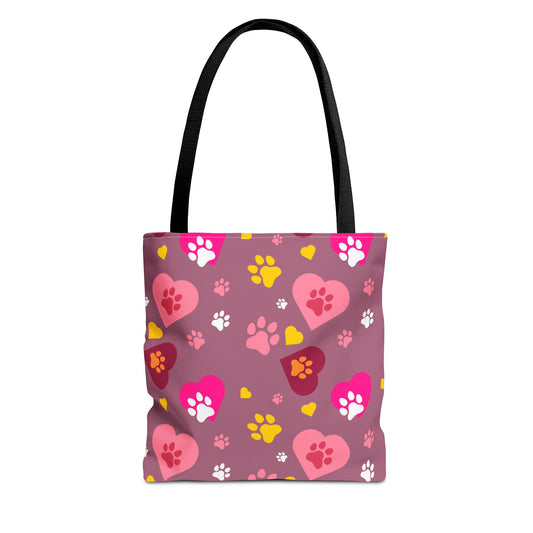 ¡Demuestra tu amor por tus peludos amigos con este clásico bolso de mano con estampado de patas! 🐾