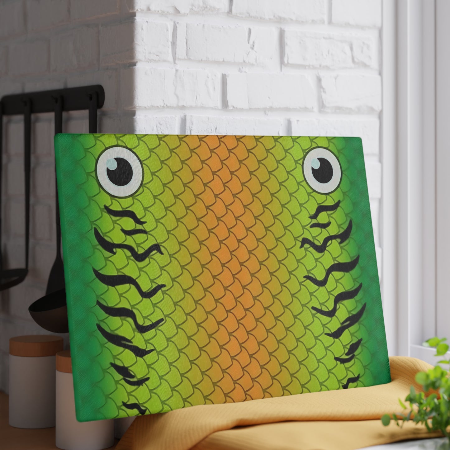 Green & Gold Fish Face Glass Cutting Board – Bold Coastal Artwork with Playful Scales
