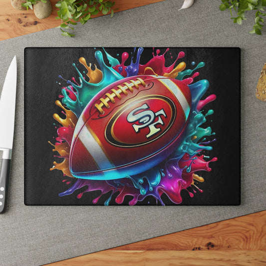 Tabla de cortar de vidrio con diseño de bola salpicada en rojo y dorado: un toque artístico y audaz para la cocina con una explosión de colores vibrantes.