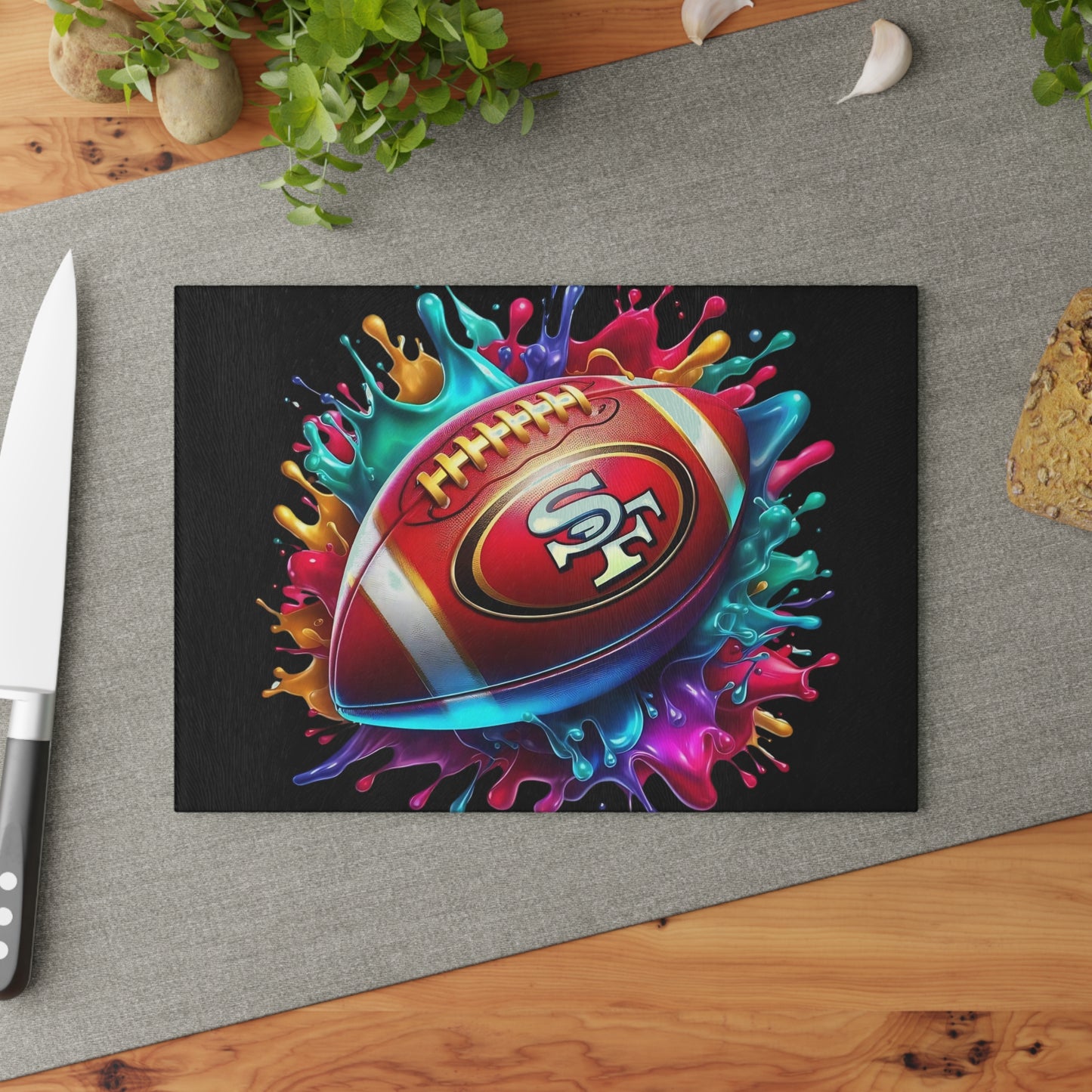 Tabla de cortar de vidrio con diseño de bola salpicada en rojo y dorado: un toque artístico y audaz para la cocina con una explosión de colores vibrantes.
