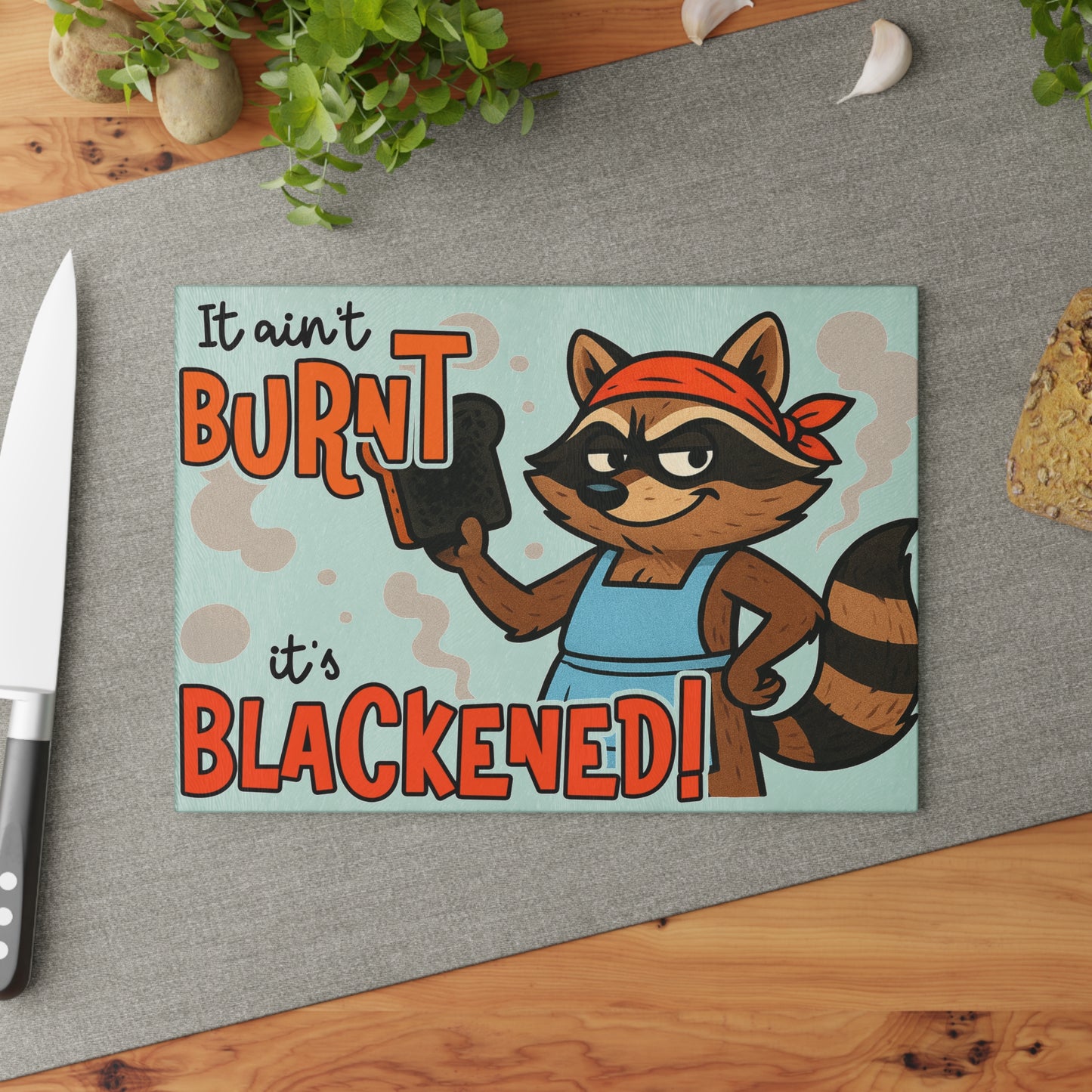 🦝🔥 Funny Raccoon Cutting Board – “It Ain’t Burnt, It’s Blackened” 😆
